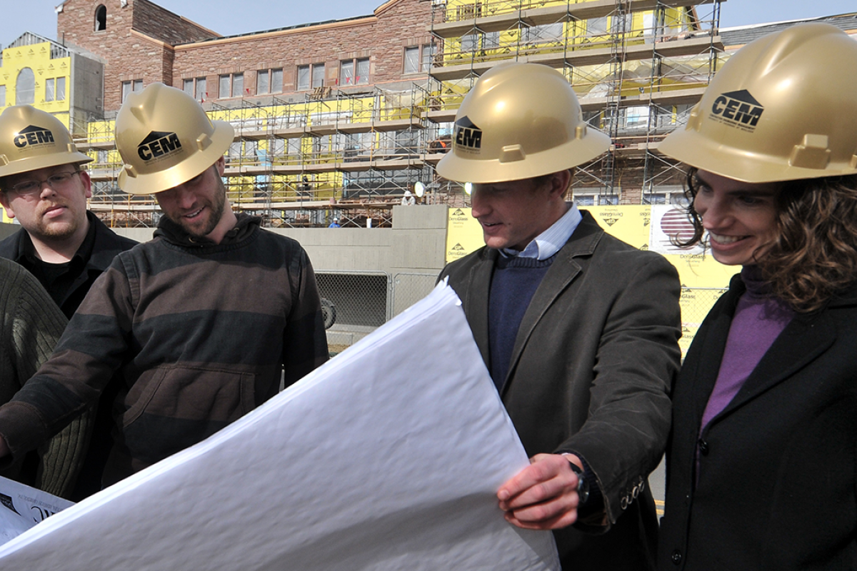 People in hard hats at a construction site