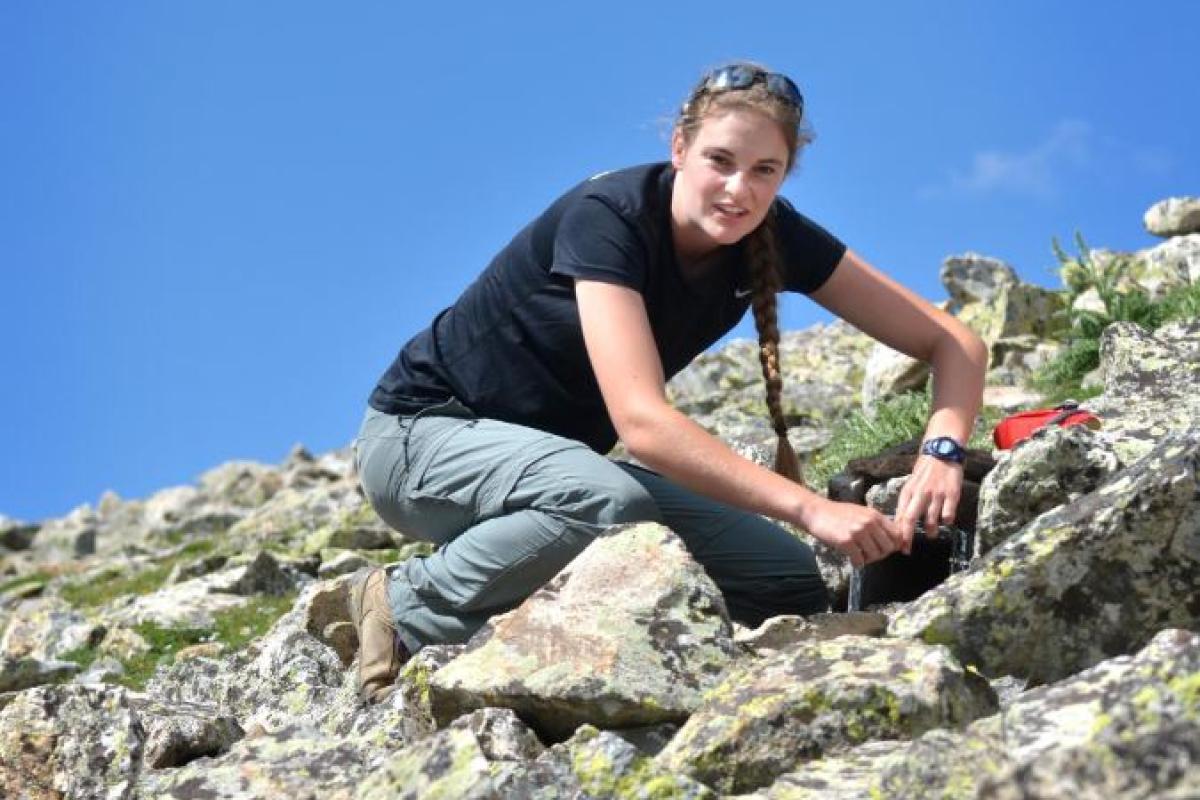 A woman doing research in alpine environment