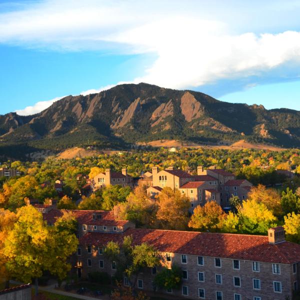 Ariel view of the University of Colorado Boulder campus and the Flatirons during fall