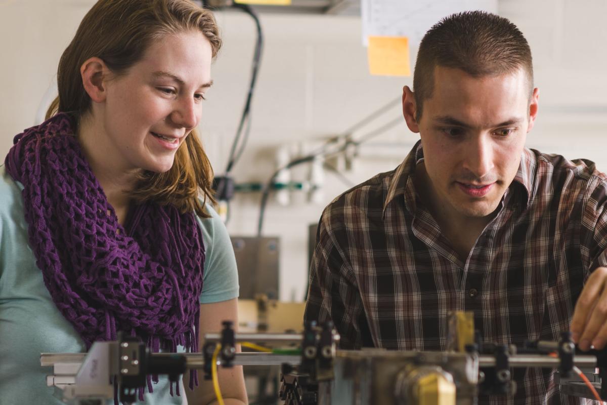A male and female student in Greg Rieker's lab.