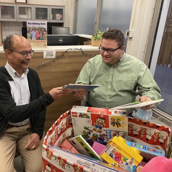 Denver Indian Center staff pick up holiday toy drive items from the ODECE office