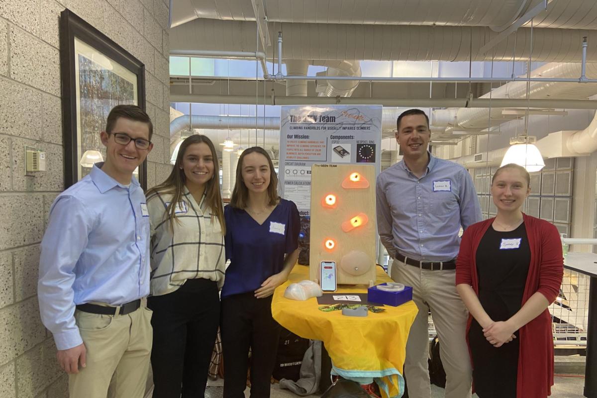 Climbing Hand Holds for Visually Impaired Climbers group stand with their project