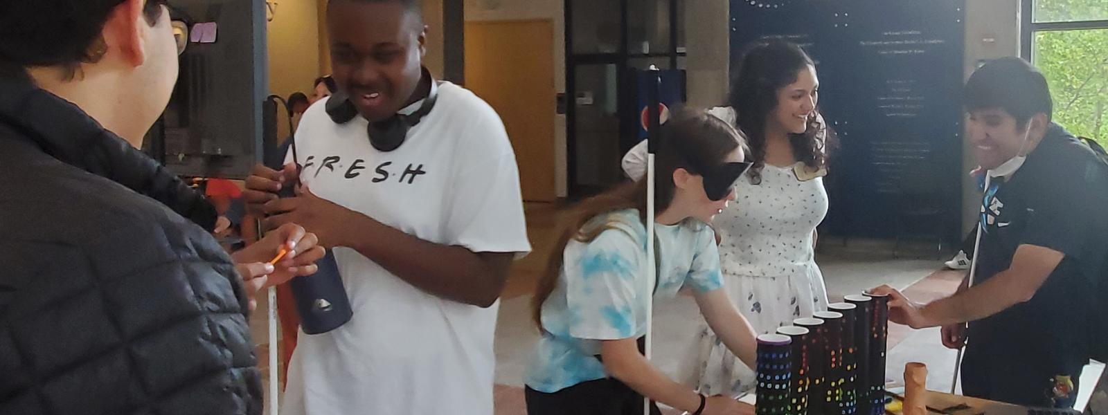 Group of people experiencing accessible items