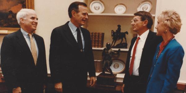 Senator John McCain, President George H.W. Bush, Bill Hunter and Sue Hunter in the Oval Office the day the sculpture was delivered to the White House.