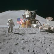Apollo 15 LEM unit and rover on the Moon with astronaut James Irwin.