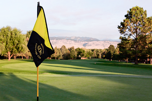 Golf Course with flag that reads Boulder Country Club