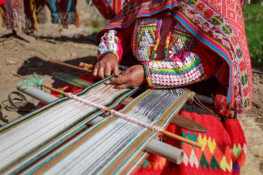 Woman weaving in Peru