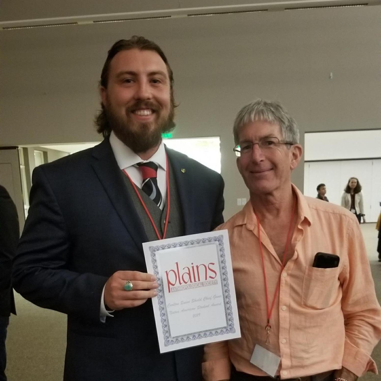 Carlton and Prof Bamforth holding a plains certificate