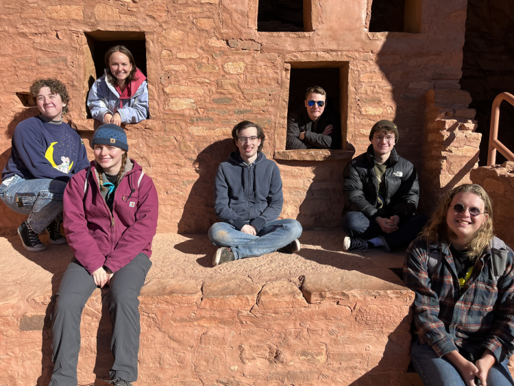 Students inside the cliff dwelling