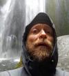 brian_crawford Standing in Front of a Waterfall