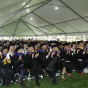 Graduates under the tent