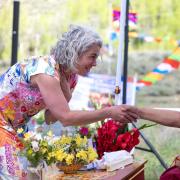 Carole greeting Khensur Rinpoche Lobsang Tsephel