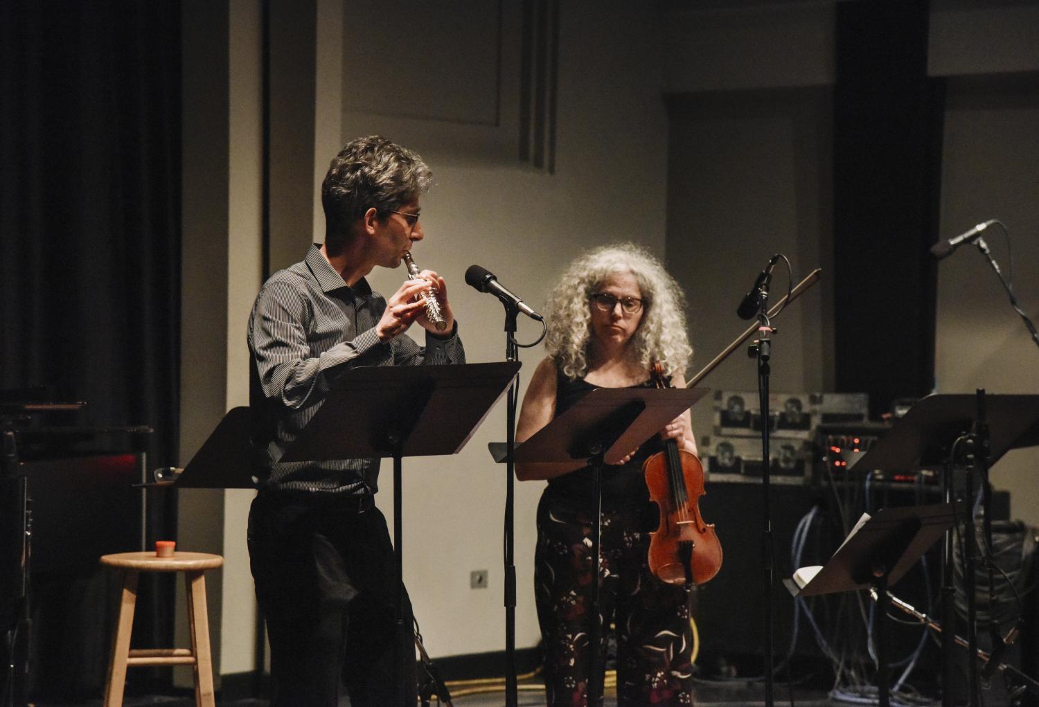 Alicia Svigals and Yonatan Malin performing on stage