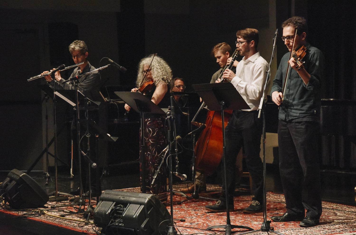 Alicia Svigals and Yonatan Malin with their band performing on stage