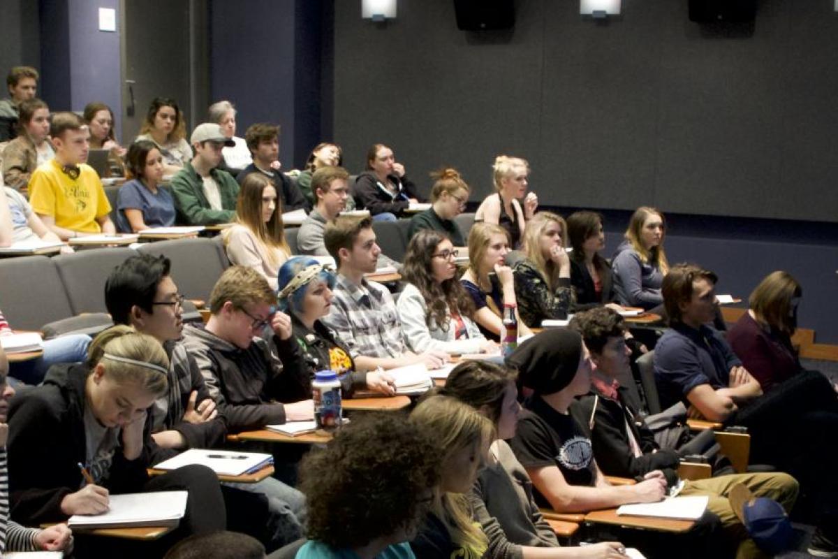 A CINE faculty member leads a discussion in one of CU Boulder's film viewing rooms.