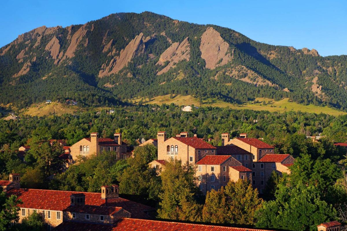 CU Boulder campus with Flatirons in background