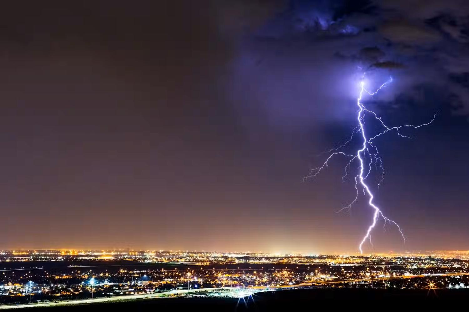 lightning bolt hitting a city
