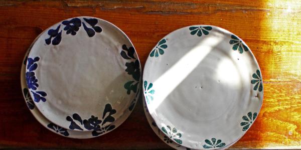 blue and white ceramic plates