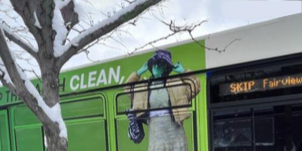 RTD bus with green fashion ad