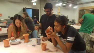 Students work with ceramics in the pottery lab as part of the Program for Excellence in Academics and Community (PEAC) in MASP.