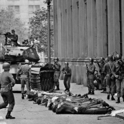 People on ground outside Chilean presidential palace during 1973 coup