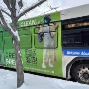 RTD bus with green fashion ad
