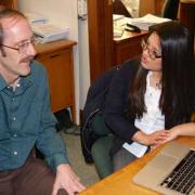 Linguistics Professor Andy Cowell discusses fieldwork with Jonnia Torres, a first-year graduate student in linguistics at CU-Boulder. She is among a team of students who are studying speakers of languages indigenous to Central America.