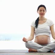 Practicing yoga during pregnancy can help prevent postpartum depression. iStockphoto.