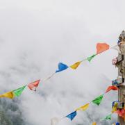 Tibetan flags on a mountain top