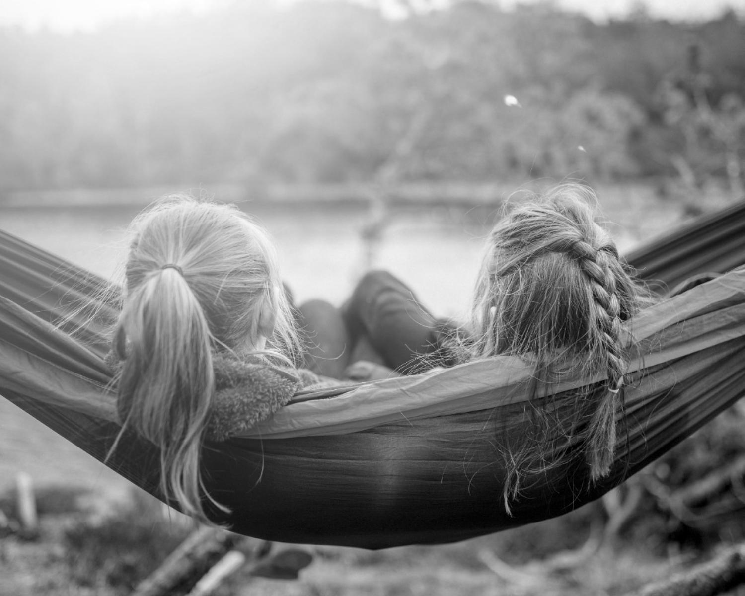 two girls on a hammock