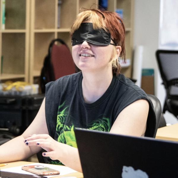 Blindfolded student tests CoPilot accessibility features