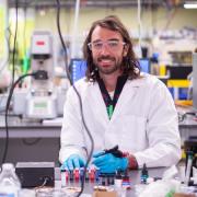 Carson Bruns in his Laboratory for Emergent Nanomaterials.
