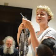 Sandra Wirtanen shows a weaving from her weaving residency.