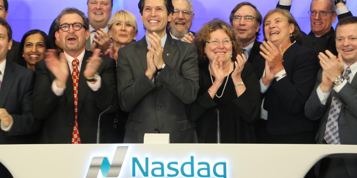 A group of people clapping