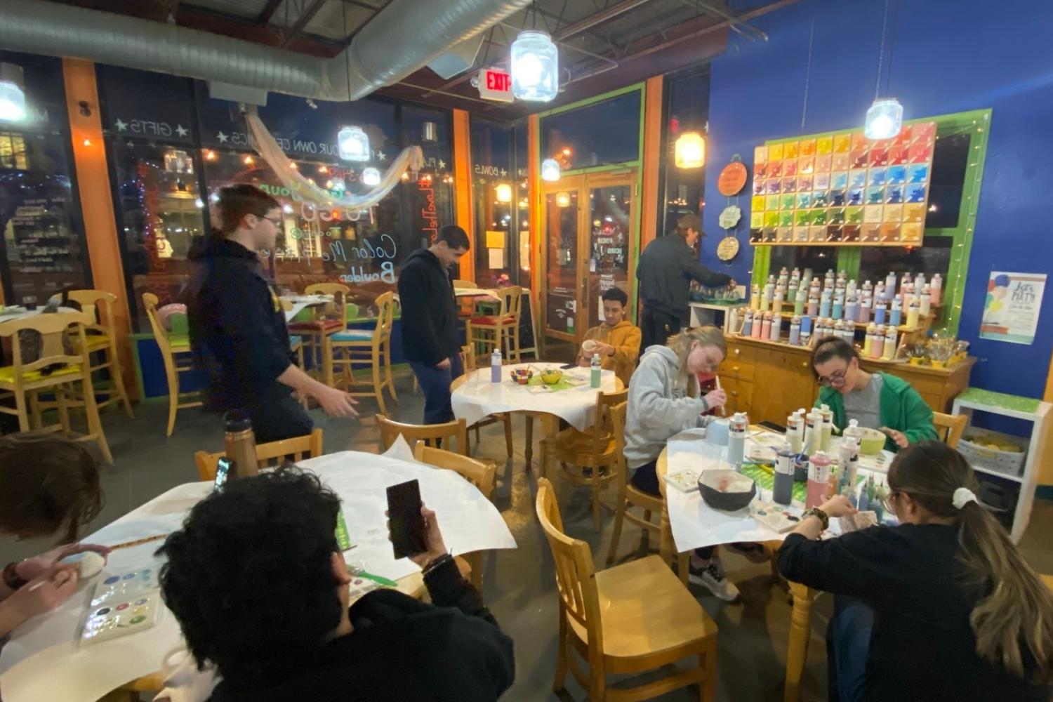 Scholars at pottery painting