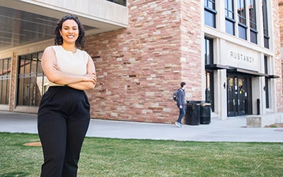 Jordyn Gerstle-Goodman in front of the Rustandy Building.