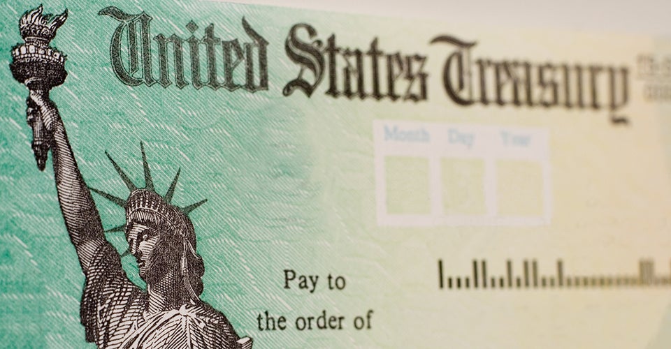 A blank check bearing the marks of the U.S. Treasury.