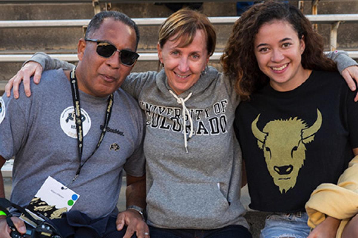Leeds alumni members and their family at a football game