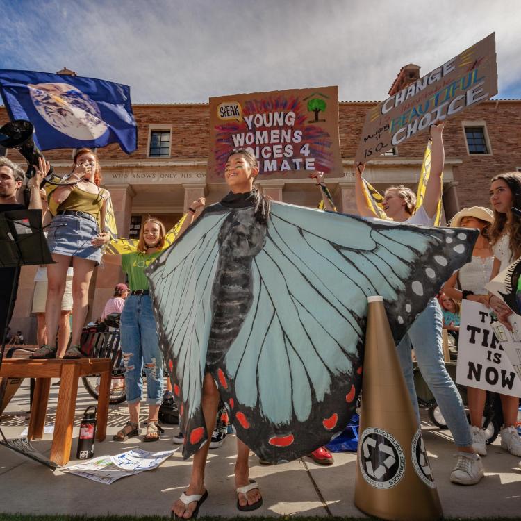 Chelsea Hackett dressed as a butterfly at a community event