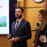 Graduate students presenting at the Natural and Organic Case Competition