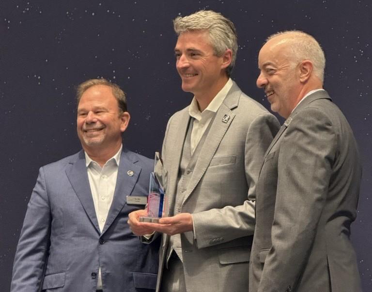 Jeffrey Parker receiving the American Astronautical Society Space Entrepreneurship Award