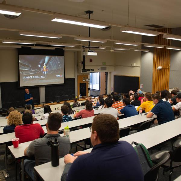 Students in a large classroom at the EIA conference