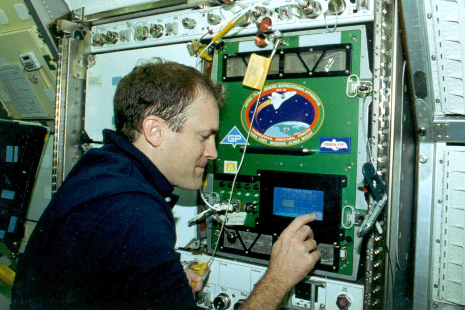 CSA astronaut Marc Garneau using PGBA on STS-77