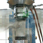 A concrete sample breaks under pressure during an experimen