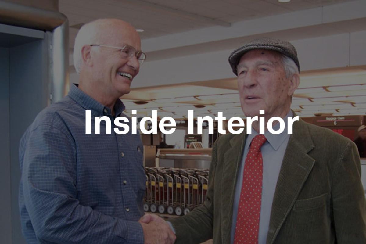 Inside Interior; James Watt shaking hands with Stewart Udall