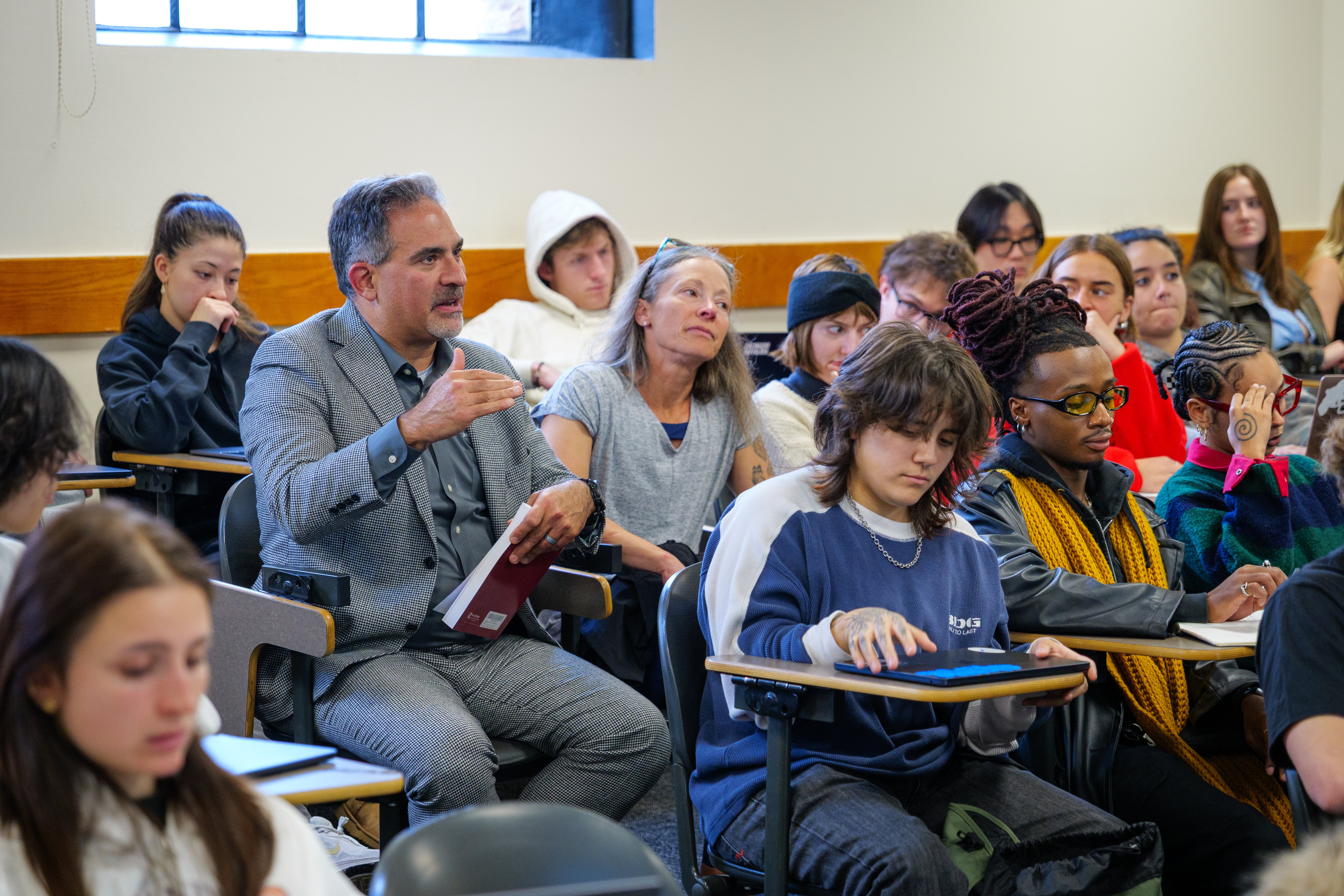 Chancellor Justin Schwartz sitting in on a class
