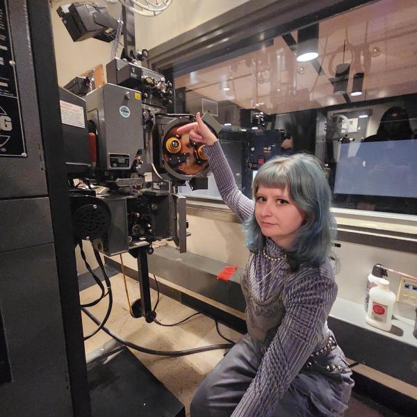 kendra Nelson with film projector