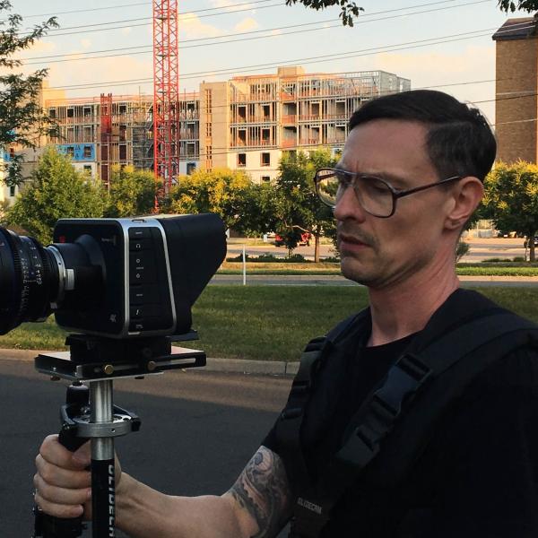 Ben Hernstrom with a Camera