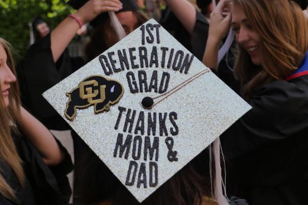 a graduation cap that says "First Gen Grad, Thanks Mom and Dad"