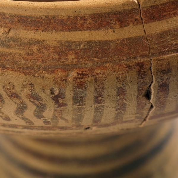 detail of banded patterning on cup